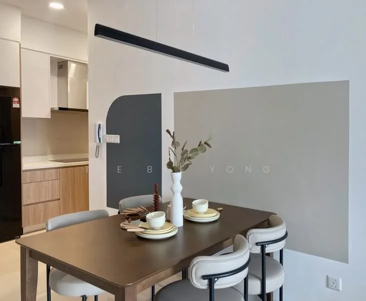 Dining features: wooden dining table, 4 upholstered dining chairs, decorative vase with greenery, white plates, gold cutlery, black pendant light, grey accent wall, white painted walls, kitchen visible in background, built-in cabinetry, stainless-steel appliances; style: modern.