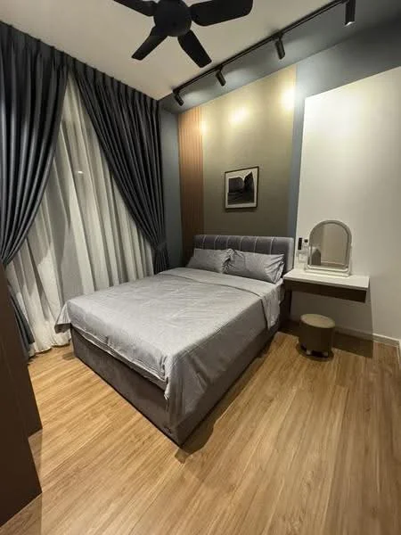 Bedroom features: queen-size bed with grey bedding, upholstered headboard, wooden bedside table, round stool, drapes in dark grey, sheer curtains, wooden flooring, ceiling fan with light, wall-mounted mirror, decorative wall paneling, framed artwork; style: modern.