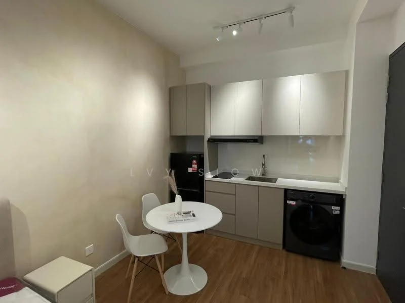Kitchen features: light grey cabinetry, white countertop, single-bowl stainless-steel sink, chrome pull-down faucet, built-in oven, freestanding washing machine, recessed downlights, wood laminate flooring, white backsplash, round dining table, two white chairs; style: modern.