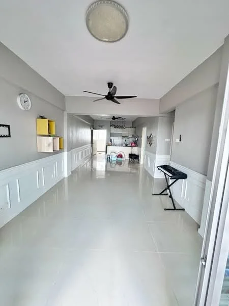 Living features: white painted walls, cream tiled flooring, 5-blade ceiling fan, wall clock, open layout, built-in cabinetry with yellow accents, sliding glass door, natural light from windows; style: modern. Kitchen features: open kitchen layout, stainless-steel appliances, kitchen island, white cabinetry, visible laundry area; style: modern.