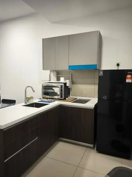 Kitchen features: L-shaped kitchen layout, white quartz countertop, single-bowl stainless-steel sink, chrome pull-down faucet, built-in microwave, black refrigerator, upper cabinets in grey, lower cabinets in dark wood, ceramic tile flooring, wall-mounted electrical outlet, splashback with neutral color, kitchen utensils on countertop; style: modern.