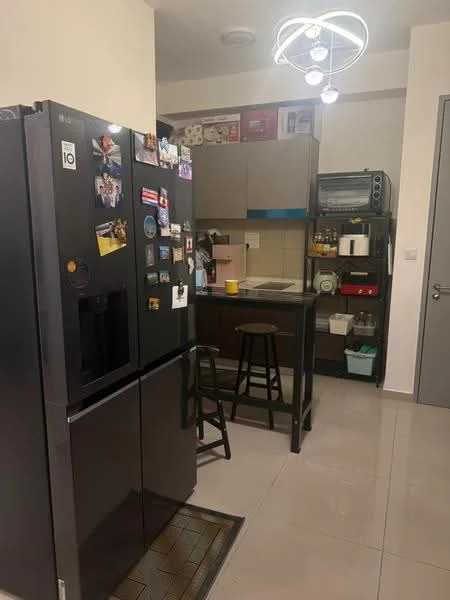 Kitchen features: black stainless-steel fridge, black bar stools, grey cabinetry, white tiled backsplash, black countertop, built-in oven, microwave, pendant light fixture, ceramic tile flooring, open shelving, kitchen utensils visible, wall-mounted storage, paper towel holder; style: modern.