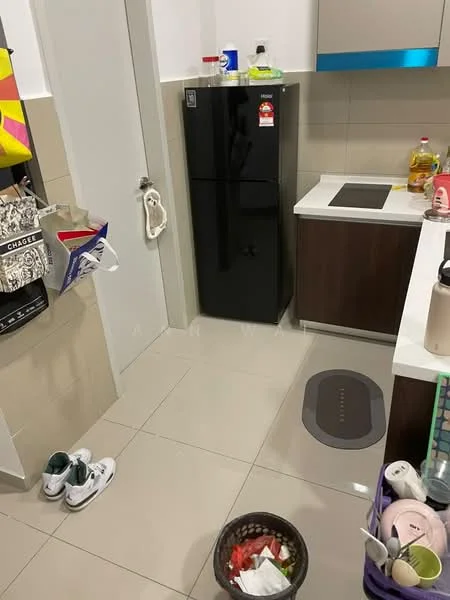 Kitchen features: black fridge, white countertop, brown cabinetry, ceramic tile flooring, wall-mounted cabinets, kitchen sink, stainless-steel faucet, cooking hob, various kitchen appliances, open shelving, decorative basket, shoes on the floor; style: modern.