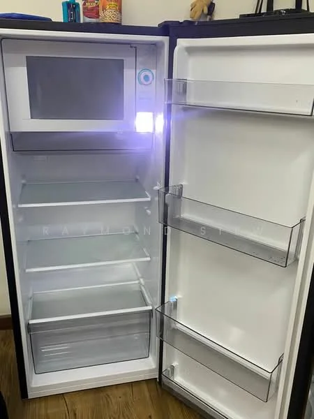 Room features: fridge, microwave, transparent shelves, clear storage bins, interior light, white interior, black exterior, wooden flooring; style: modern.