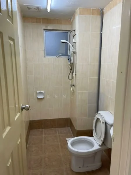 Bathroom features: cream tiled walls, brown tiled flooring, one-piece toilet, shower with handheld showerhead, wall-mounted shower faucet, window for natural light, light fixture on ceiling, towel rail.