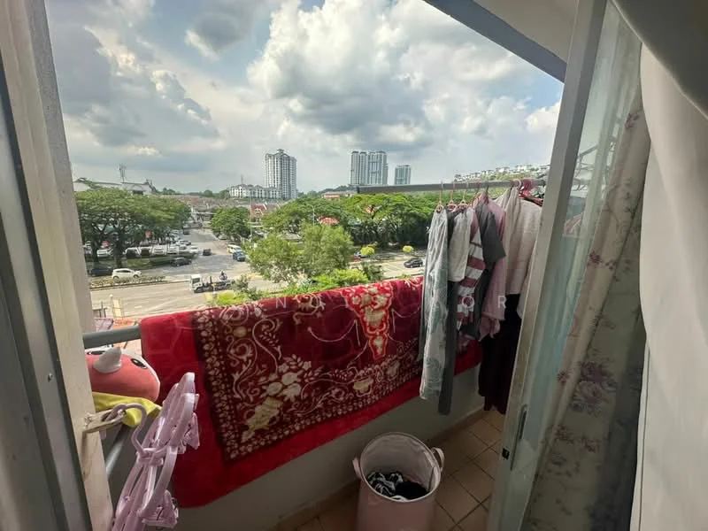 Room features: balcony, clothes drying rack, view of city skyline, paved flooring, railings, outdoor space, hanging clothes, plastic laundry basket; view: city.