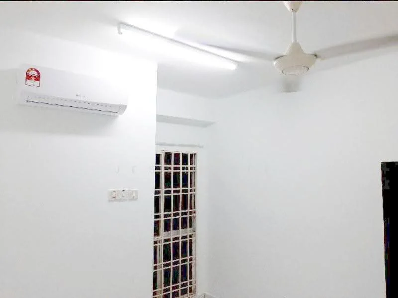 Room features: white painted walls, ceiling fan, wall-mounted split AC, window with grille, light fixture.