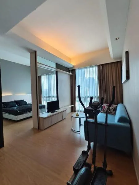Living features: light wood flooring, grey accent wall, floor-to-ceiling windows, sheer curtains, blue fabric sofa, glass coffee table, TV console, wall-mounted TV, decorative artwork, recessed lighting, ceiling with ambient lighting, exercise equipment; style: modern; view: city. Room features: bed with black bedding, bedside table, wall-mounted artwork, curtains.
