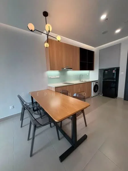 Kitchen features: wood cabinetry, white countertop, stainless-steel sink, chrome pull-down faucet, built-in oven, stainless-steel fridge, washing machine, pendant lighting, dining table with wooden surface, 4 black chairs, grey wall, light grey floor tiles; style: modern.