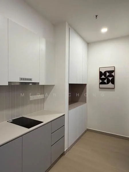 Kitchen features: white cabinetry, flat-panel cabinet doors, light grey countertop, built-in induction cooktop, white tiled backsplash, recessed downlights, framed artwork on wall, laminate flooring; style: modern.