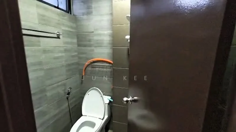 Bathroom features: one-piece toilet, wall-mounted faucet, shower head, grey tiled walls, dark tiled flooring, towel rack, mirror, window for natural light; style: modern.