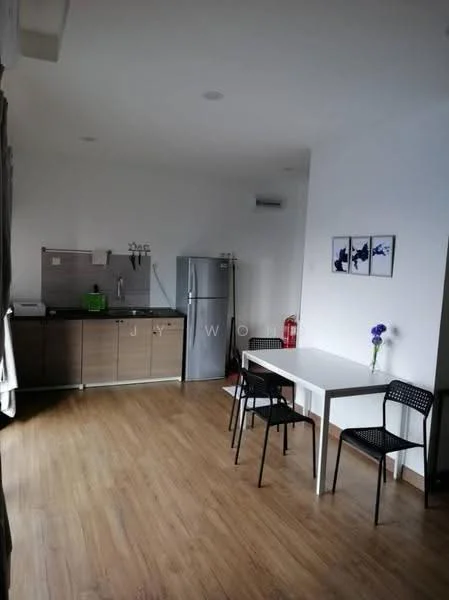 Kitchen features: grey cabinetry, black countertop, stainless-steel fridge, built-in sink, single-bowl stainless-steel sink, chrome faucet, ceramic tile backsplash, wood laminate flooring, recessed downlights, dining table with white surface, 4 black dining chairs; style: modern.