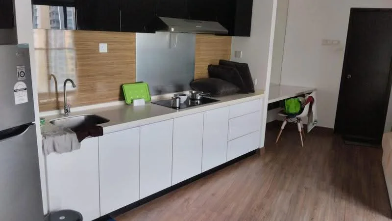 Kitchen features: white cabinetry, black countertop, stainless-steel sink, chrome pull-down faucet, built-in stove with two burners, exhaust hood, wood panel accent wall, laminate flooring, refrigerator, dining table, chair, wall-mounted storage; style: modern.