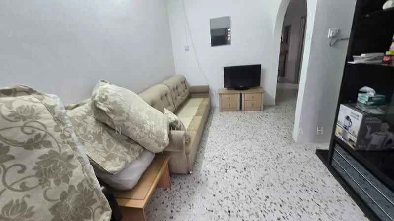 Living features: 3-seater fabric sofa in beige, decorative cushions, wooden coffee table, wall-mounted TV, TV console, speckled tile flooring, white painted walls, mirror on wall, arched doorway, built-in shelving unit.