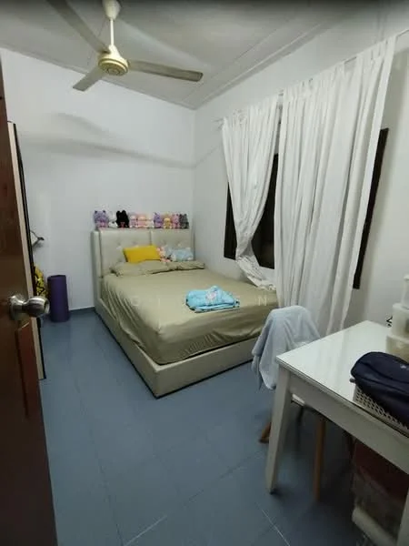 Bedroom features: queen-size bed, upholstered headboard, white bedding, light blue throw blanket, wooden bedside table, white desk, chair, ceiling fan, white curtains, dark window frames, blue tile flooring, stuffed animals on headboard.