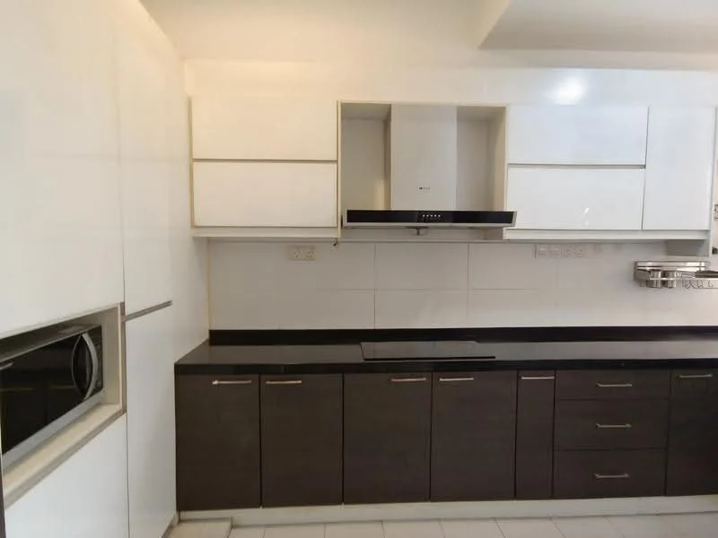 Kitchen features: white high-gloss cabinetry, dark wood lower cabinets, black granite countertop, built-in oven, stainless-steel range hood, ceramic tile backsplash, single-bowl stainless-steel sink, chrome pull-down faucet, integrated microwave, recessed downlights, white tiled flooring; style: modern.