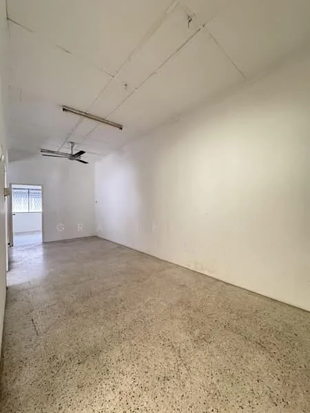 Room features: white painted walls, exposed ceiling, concrete flooring, ceiling fan, window with grille, no visible furniture or decor; style: minimalist.