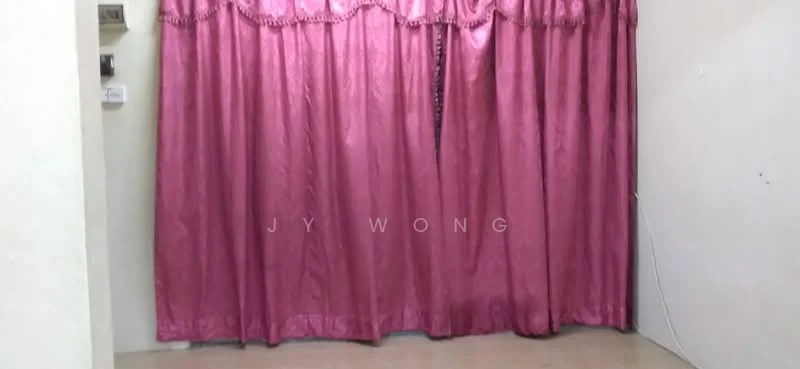 Room features: pink curtains, plain white walls, light-colored flooring.