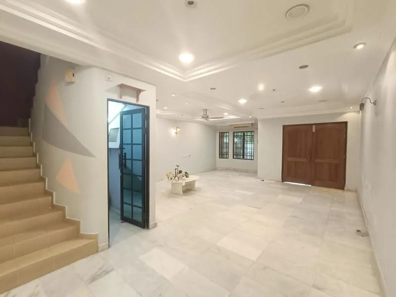 Living features: white painted walls, marble flooring, tray ceiling with recessed lighting, 5-blade ceiling fan, large windows for natural light, double wooden doors, open layout, decorative wall design, central coffee table, staircase leading to upper floor; style: modern. Room features: white painted walls, marble flooring, glass door, staircase with beige steps.