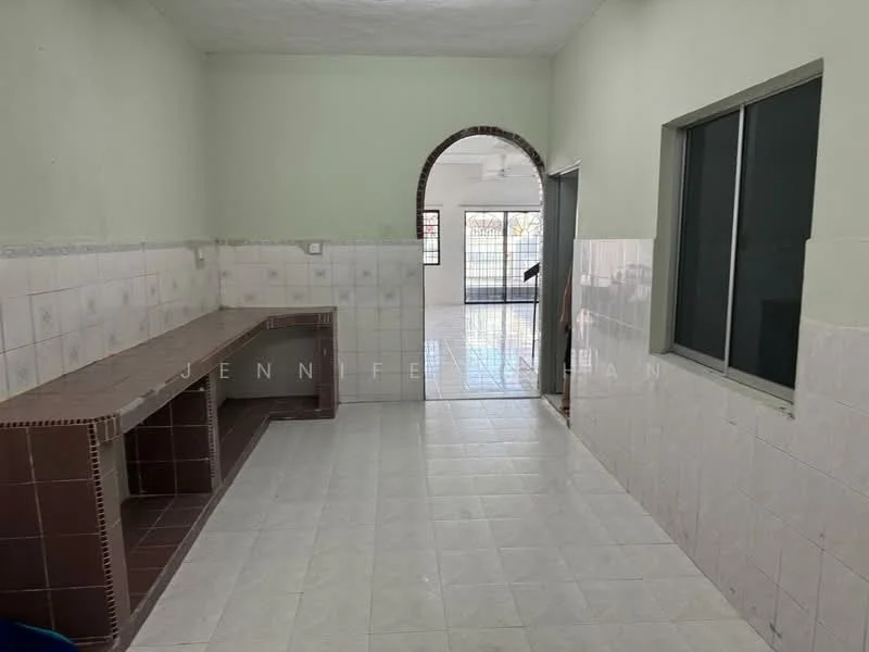 Room features: white painted walls, light grey tiled flooring, white ceiling, arched doorway, window with metal frame, built-in counter with tiled surface, ceramic wall tiles, open layout; style: modern.