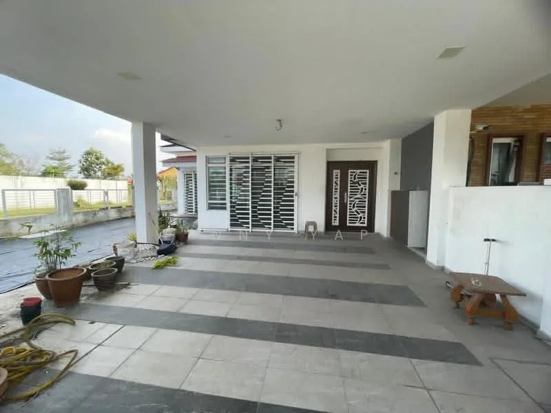 Exterior type: detached bungalow; features: covered porch, grey tiled flooring, white painted walls, decorative wooden door, sliding glass windows, landscaped area with potted plants, exposed concrete wall, manicured lawn, driveway with interlocking pavers; style: modern.
