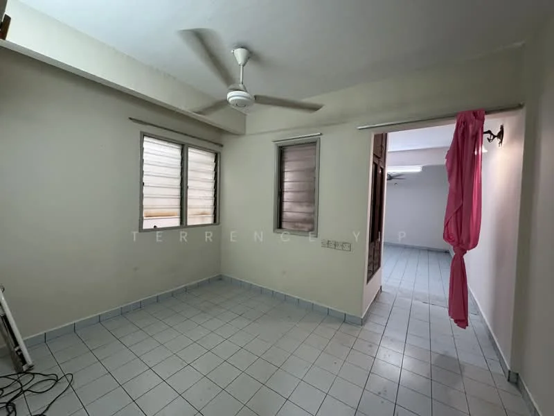 Room features: white painted walls, ceiling fan, tile flooring, two windows, light fixture on wall, pink curtain, corner of room with no visible furniture.