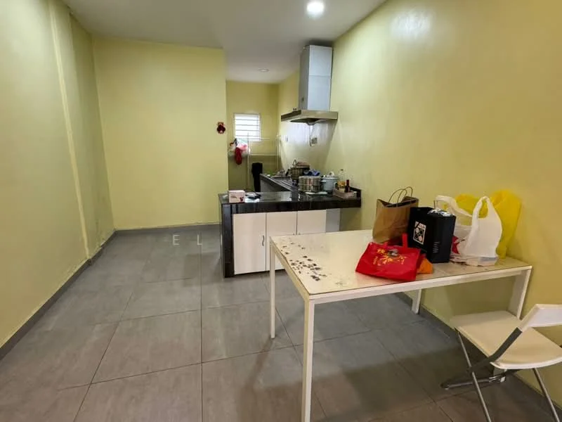 Kitchen features: yellow painted walls, grey tile flooring, kitchen island with black countertop, stainless-steel sink, stainless-steel range hood, built-in stove, wall-mounted cabinets, refrigerator, table with white surface, two white chairs; style: modern.