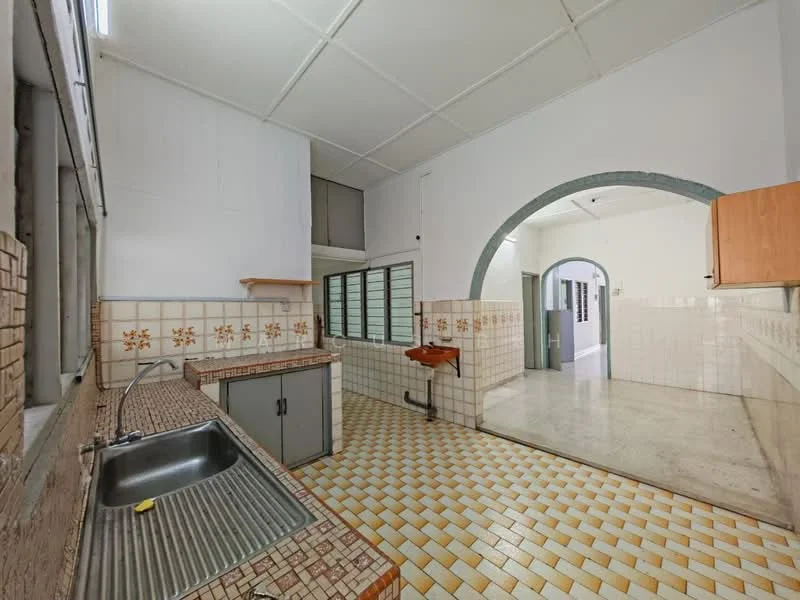 Kitchen features: single-bowl stainless-steel sink, chrome faucet, laminate countertop, tiled backsplash with floral pattern, grey cabinetry, cream tiled flooring, white painted walls, exposed ceiling, window with metal grille, open layout to adjacent room; style: traditional. Room features: white tiled walls, arched doorway, polished concrete flooring, natural light from windows.
