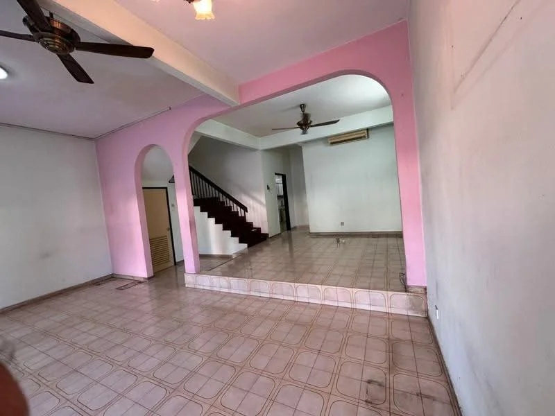 Living features: pink accent wall, white painted walls, ceramic tile flooring, ceiling fan, arched doorways, staircase in background, mirror on wall, natural light from windows.