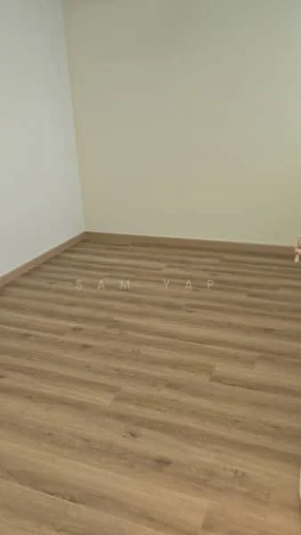 Room features: light green painted walls, laminate flooring in light wood finish.
