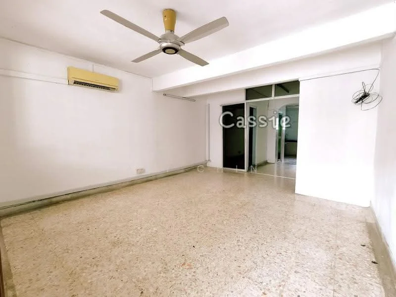 Room features: white painted walls, terrazzo flooring, 5-blade ceiling fan, wall-mounted split AC, sliding glass door, large windows, neutral color scheme, no visible furniture; style: minimalist.