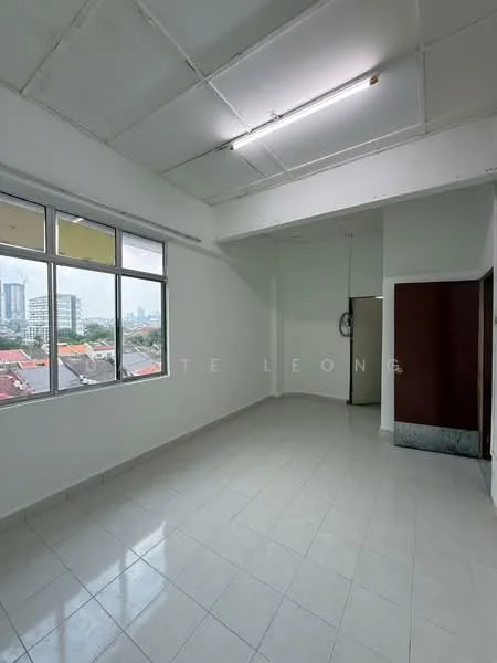 Room features: white painted walls, tile flooring, large windows, city skyline view, plain ceiling, no visible furniture, neutral color scheme, corner room; style: minimalist; view: city.