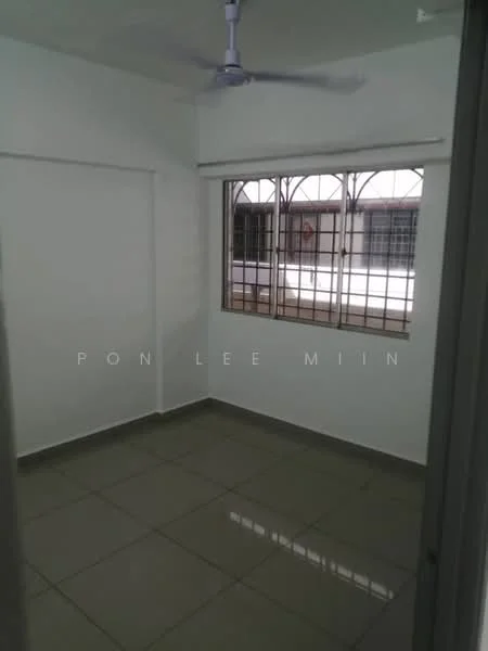 Room features: white painted walls, grey tile flooring, ceiling fan, window with metal grille, natural light from window.