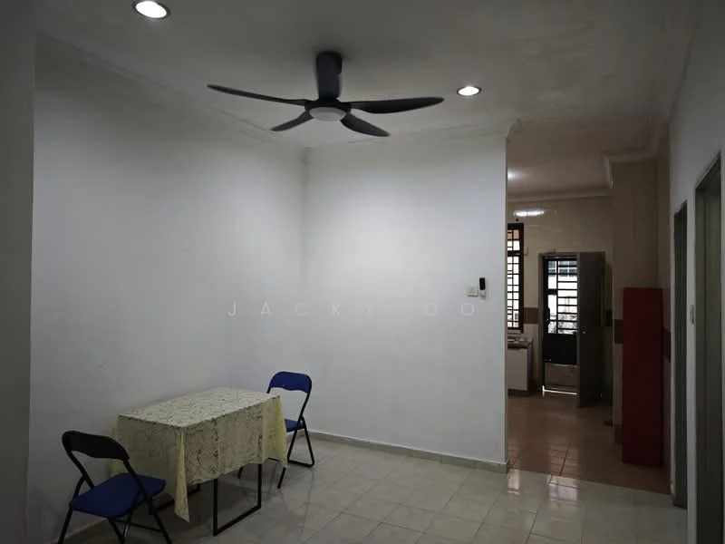 Room features: white painted walls, ceiling with recessed downlights, 5-blade ceiling fan, tiled flooring, small dining table with tablecloth, two folding chairs; style: minimalist.