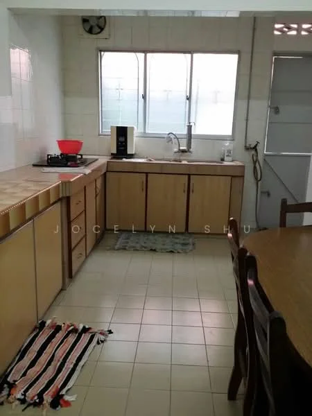Kitchen features: wood cabinetry, laminate countertop, single-bowl stainless-steel sink, chrome pull-down faucet, gas stove, built-in coffee machine, tile backsplash, ceramic tile flooring, window with grid pattern, door leading outside, area rug, dining table, wooden dining chairs.