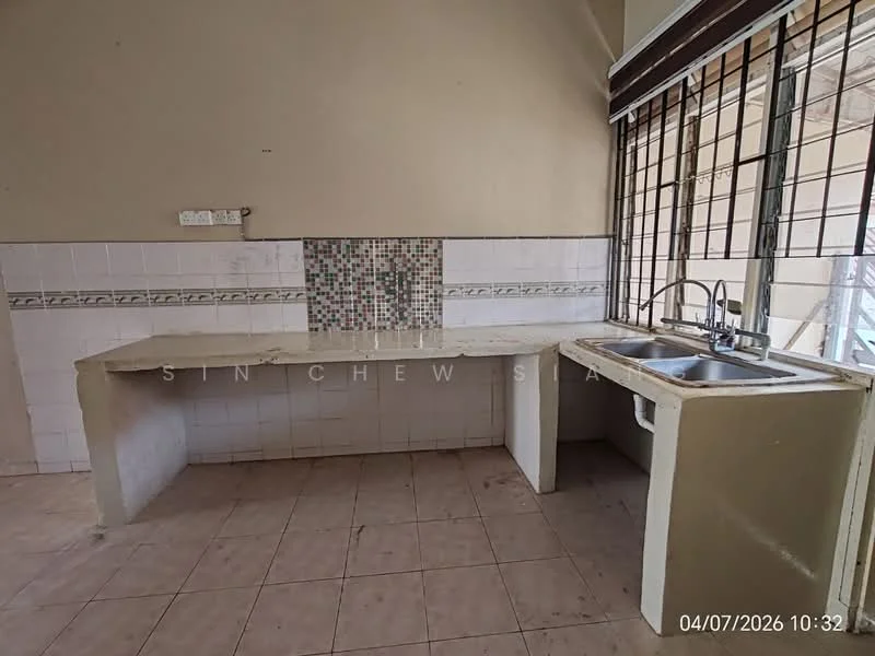 Kitchen features: double-bowl stainless-steel sink, chrome pull-down faucet, white tiled backsplash with decorative pattern, white tiled walls, light beige tiled flooring, countertop with built-in cabinetry, window with metal grilles, open layout, no visible appliances.