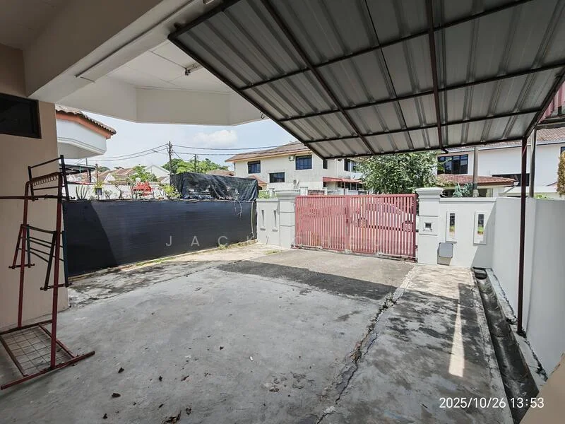 Exterior type: linked terrace house; features: covered car porch, concrete flooring, white painted walls, red metal gate, fenced perimeter, manicured lawn, surrounded by residential buildings, partial shade from roof; style: modern.