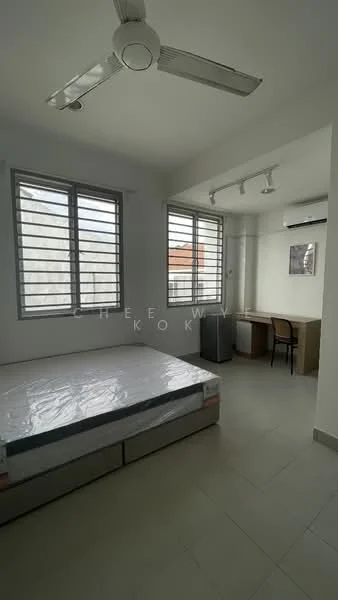 Bedroom features: queen-size bed, 2 windows with horizontal metal grilles, white painted walls, ceiling fan, recessed downlights, study desk, chair, mini fridge, air conditioning unit, tile flooring; style: modern.