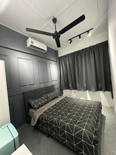 Bedroom features: king-size bed with patterned bedding, black accent wall with paneling, white painted walls, 5-blade ceiling fan, wall-mounted air conditioning unit, blackout curtains, laminate flooring, decorative lighting track; style: modern.