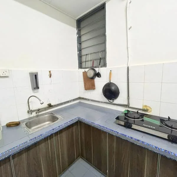 Kitchen features: single-bowl stainless-steel sink, chrome pull-down faucet, ceramic tile backsplash, blue tiled countertop, wood cabinetry, 2-burner gas hob, black frying pan, hanging utensils, window with metal grille, white tiled walls.