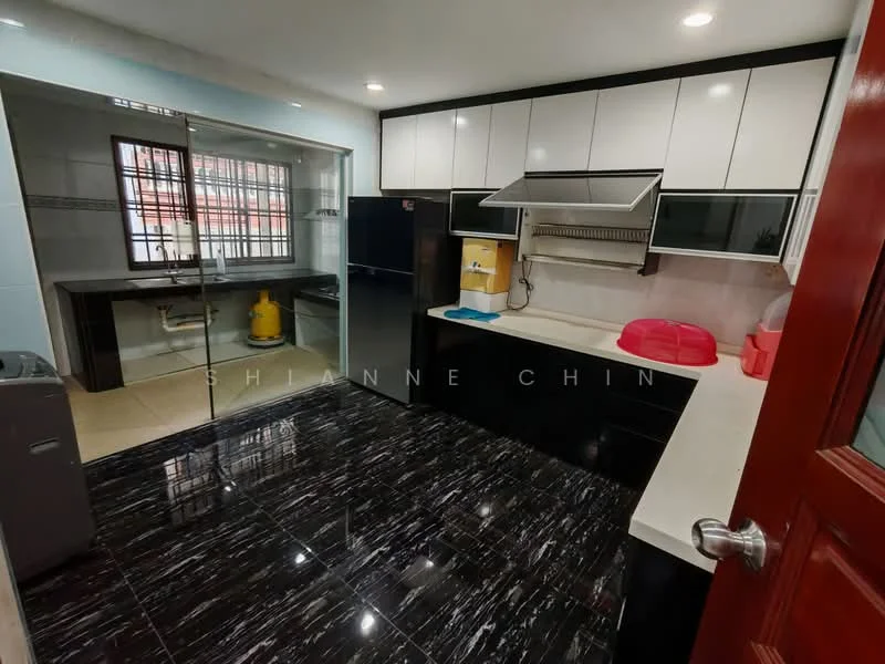 Kitchen features: black glossy cabinetry, white countertop, stainless-steel sink, chrome pull-down faucet, built-in range hood, freestanding refrigerator, black marble tile flooring, window with metal grille, yellow gas cylinder, washing machine, wall-mounted cabinets, tile backsplash; style: modern.