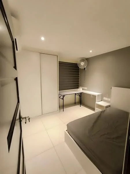 Bedroom features: grey painted walls, white ceiling, recessed downlights, floor-to-ceiling window with roller blinds, queen-size bed with grey bedding, white built-in wardrobe, study desk with metal legs, white tile flooring, ceiling fan; style: modern.