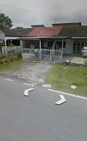Exterior type: semi-detached house; features: white painted facade, red tiled roof, front yard with grass, paved driveway, fenced front yard, garden with potted plants, single-storey, visible street view; style: traditional.