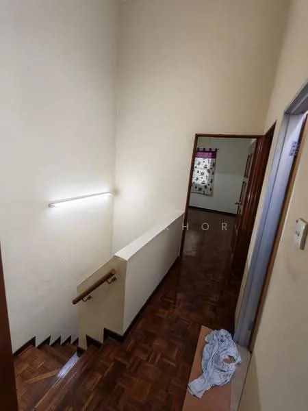 Room features: wooden staircase, parquet wood flooring, white painted walls, handrail, ceiling light fixture, doorway to adjacent rooms.