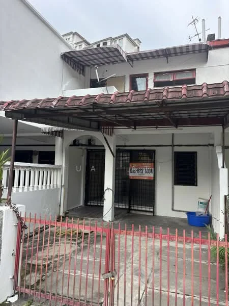 Exterior type: linked terrace house; features: red tiled roof, white painted facade, metal gate, concrete flooring, front porch area, fenced yard, overhead awning, multiple storeys visible, outdoor lighting fixtures, windows with security bars; style: modern.