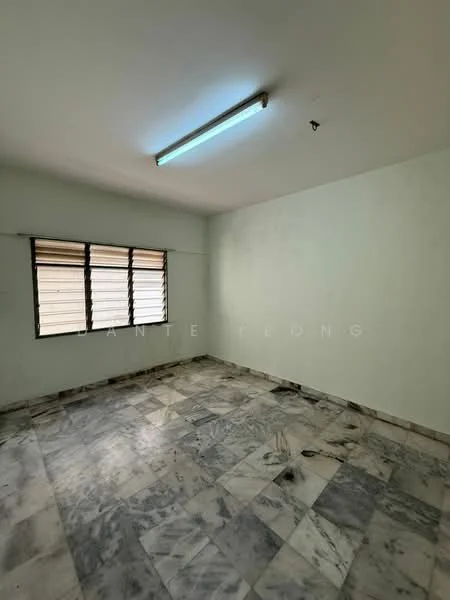 Room features: light green painted walls, marble flooring, single fluorescent ceiling light, sliding windows with metal grilles, no visible furniture or decor.