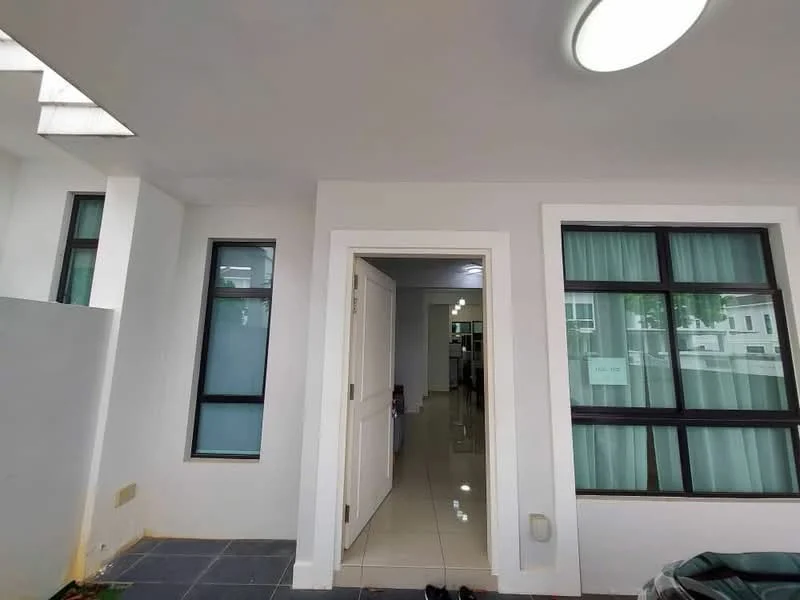 Room features: white painted walls, tile flooring, large windows with black frames, glass door, ceiling light fixture, curtains, open layout, doorway leading to another room; style: modern.
