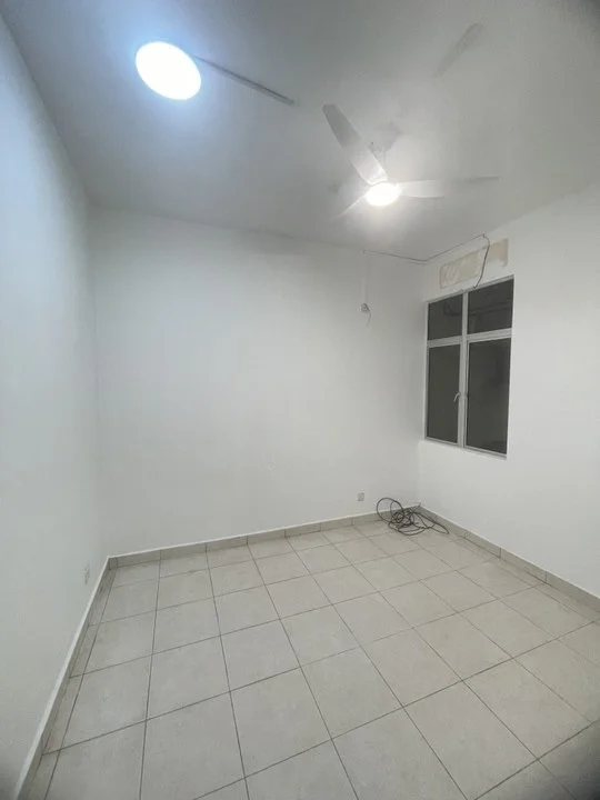 Room features: white painted walls, tile flooring, ceiling fan, recessed ceiling light, single window, neutral color scheme, no visible furniture, exposed electrical wiring.