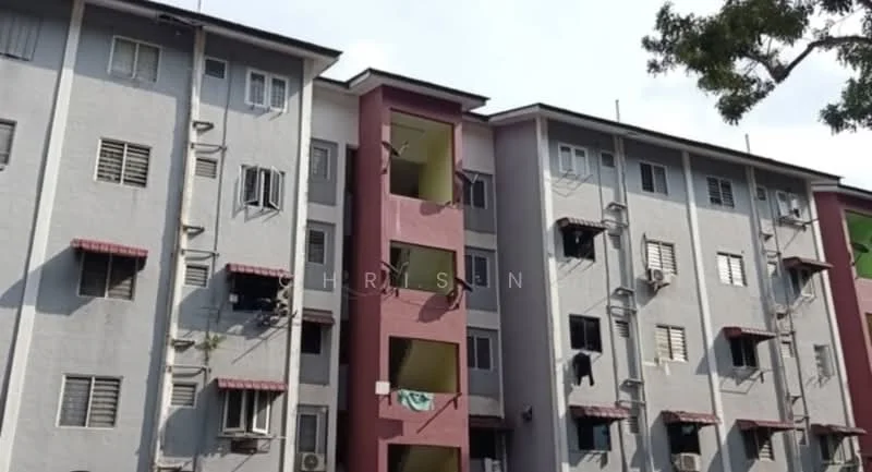 Exterior type: low-rise apartment block; features: grey painted facade, red accent wall, balconies with awnings, window air conditioning units, multiple floors, exposed concrete, laundry hanging on balcony; style: modern.