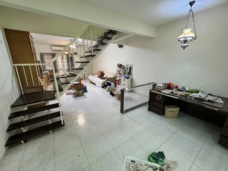 Living features: white painted walls, ceramic tile flooring, staircase with wooden steps, chandelier, large window with curtains, sofa, coffee table, desk with clutter, decorative items scattered, air conditioning unit on wall.